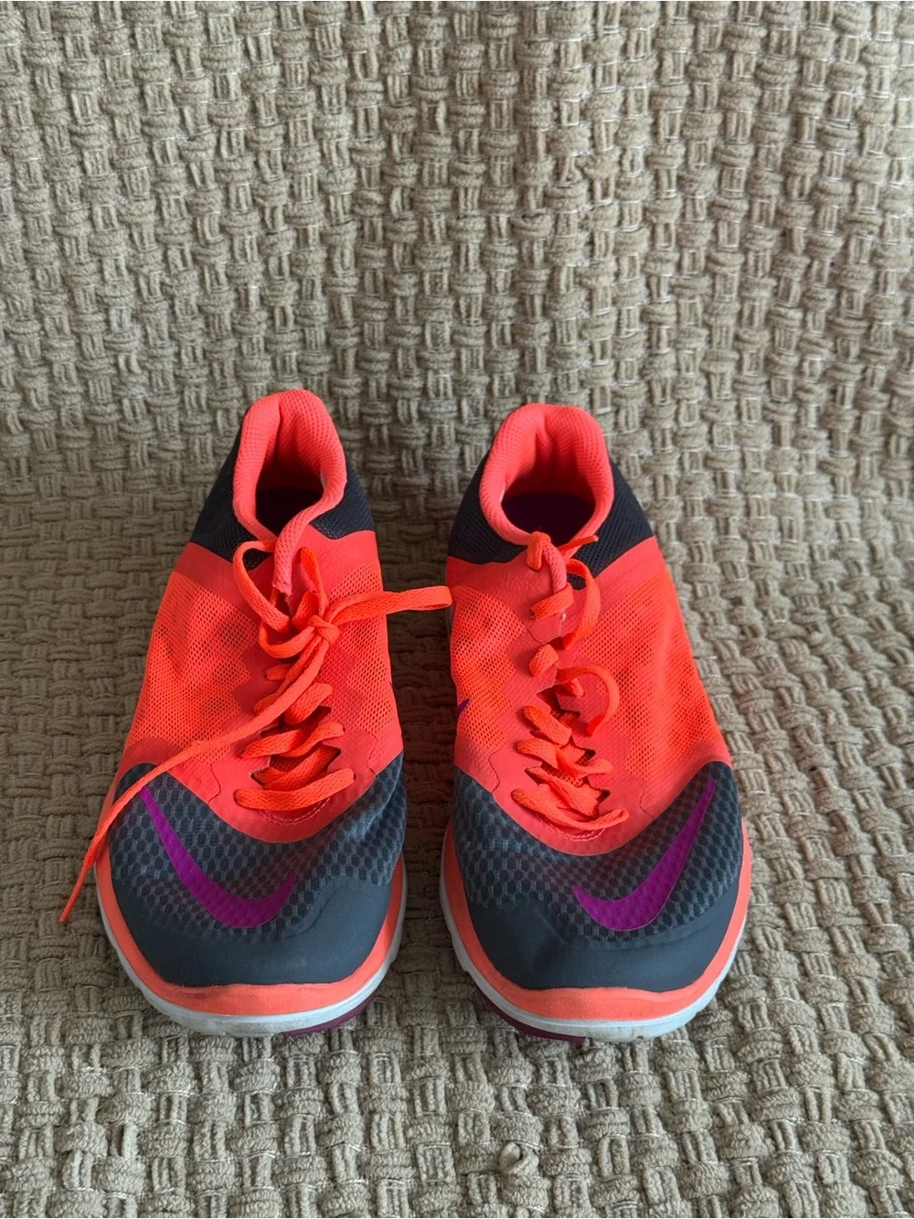 Nike Women's Neon Orange Running Sneakers with Purple Swoosh